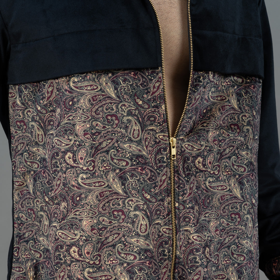 Close-up view of Twennysix Velvet Blend Jacket, highlighting intricate Kalamkari print and velvet texture. Golden zipper adds luxe detail to the design.