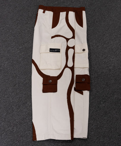 Side view of MochaBlend Cargo Pant by Twennysix, showcasing its rugged design and coffee cream hues.