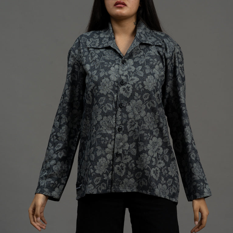 A model wearing the Charcoal Petal Shirt, exemplifying its versatility and luxurious feel.