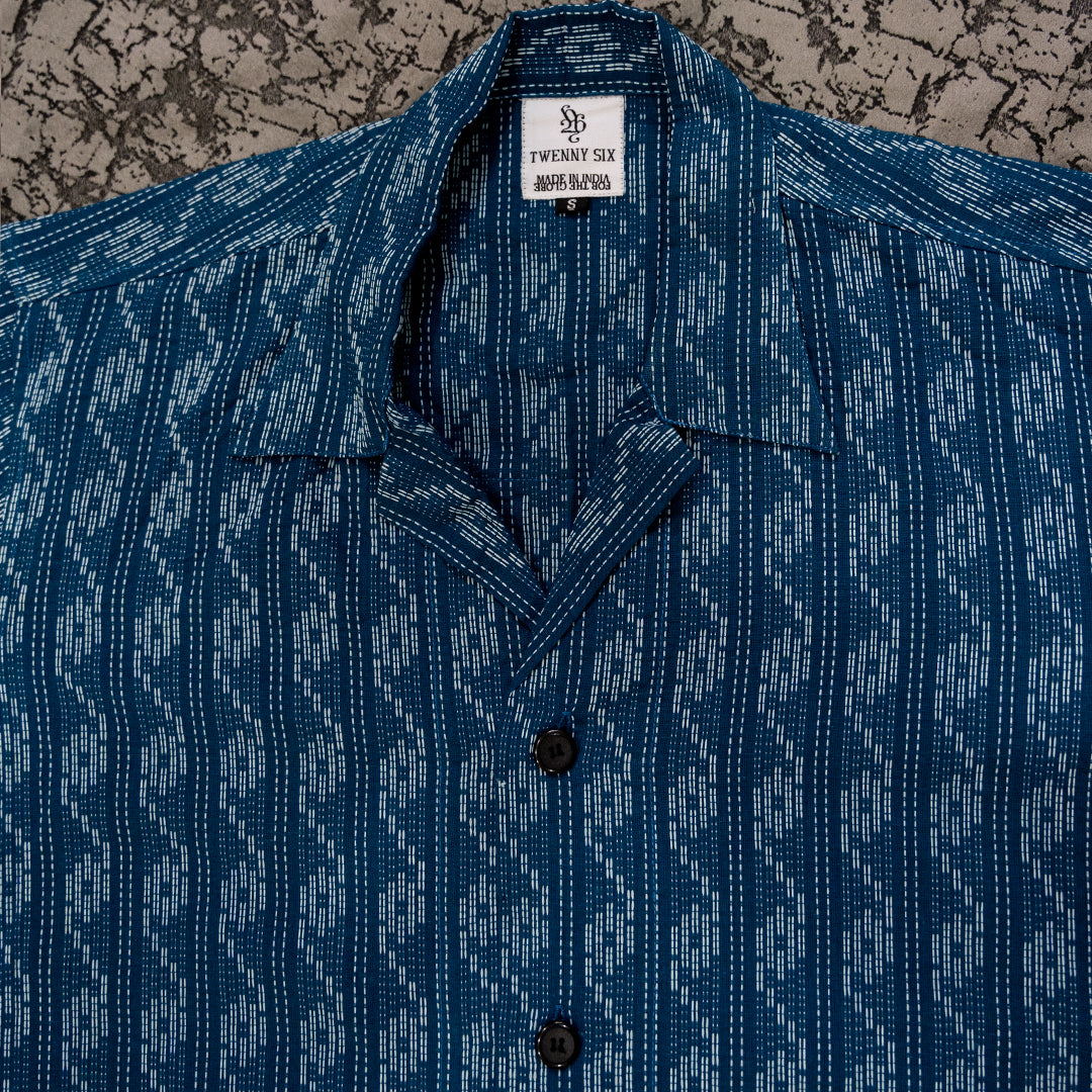 Close-up image showing the collar detail of the blue wave Kantha shirt, highlighting its intricate stitching and craftsmanship.