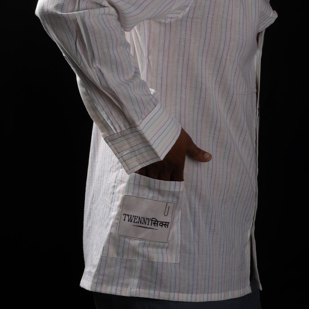 Left side view of Twennysix Kantha Breeze Shirt featuring pocket with Twennysix patch.