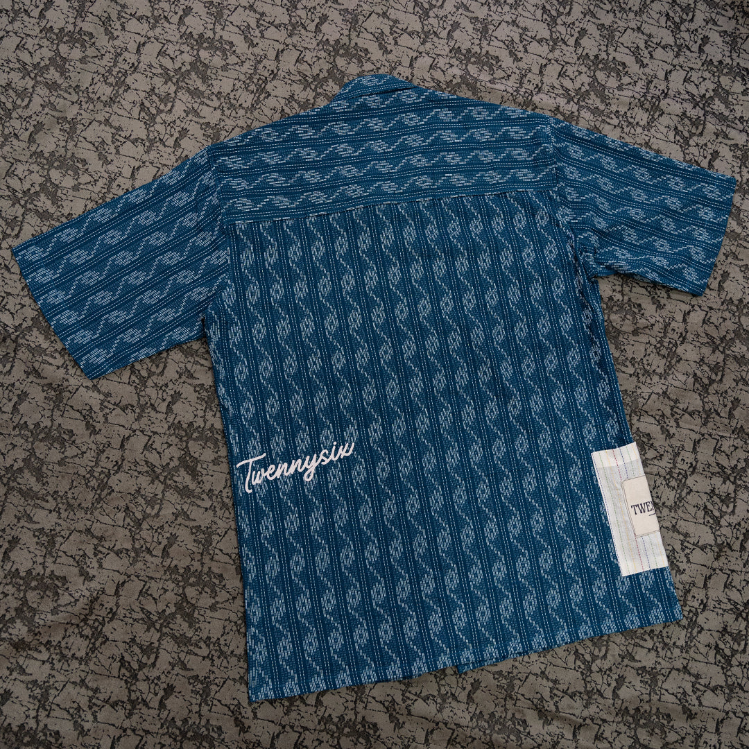 Flat lay image displaying the back view of the blue wave Kantha shirt, featuring its soft Kantha fabric and subtle Twennysix branding.